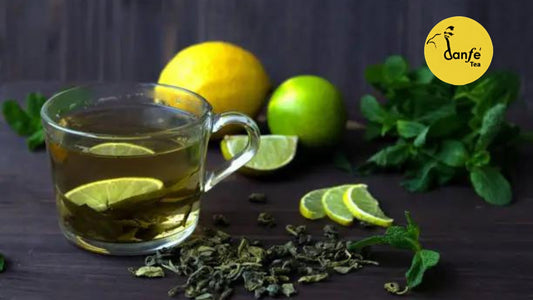 cup of citrus green tea with fresh lemon