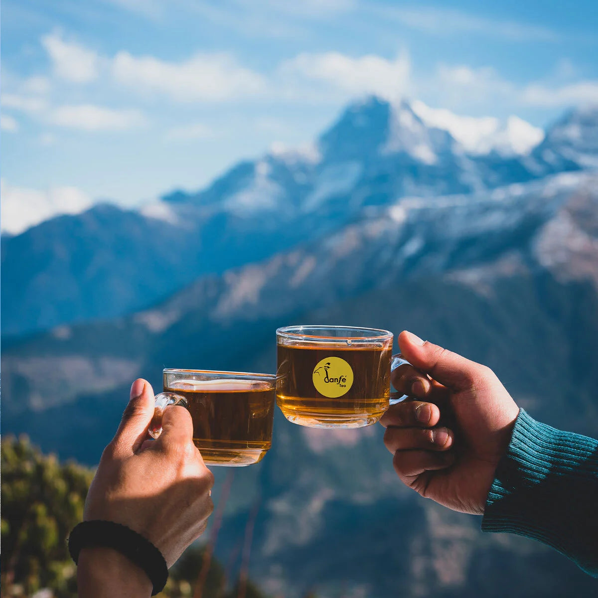 black loose leaf teas with Himalayan background cheering