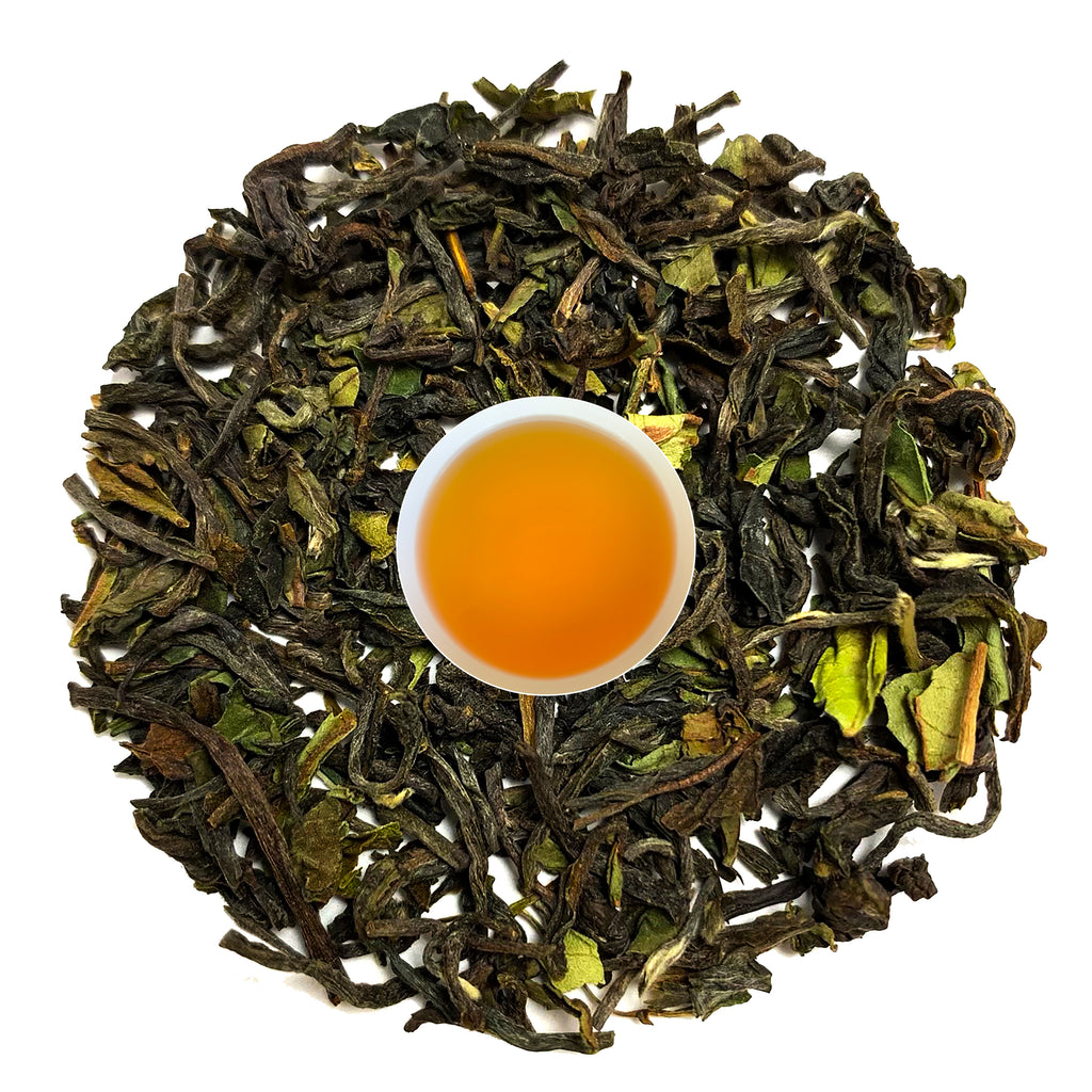 Grown in the Himalayan mountains of Nepal, this award-winning Nepal ilam black tea is rich and mellow, with a slight malty sweetness and notes of honey and stone fruit. 