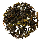 oolong tea is dried leaves and leaf buds are used to make several different teas, including black and green teas. Oolong tea is fermented for longer than green tea, but less than black tea. It contains caffeine which affects thinking and alertness.