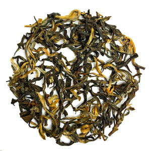 Golden tips are the small, unopened leaves of the tea plant. Tea farmers in Nepal realized that the tea tips were the sweetest part of the tea leaf—the tea plants store all of the nutrients over the winter, so in the spring, the nutrients are pushed out in the first tea tips.